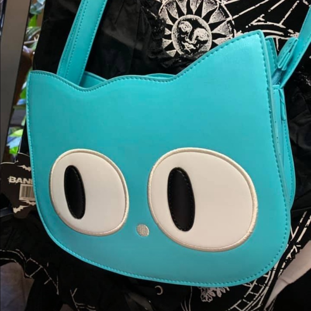 Addis NWT purse
